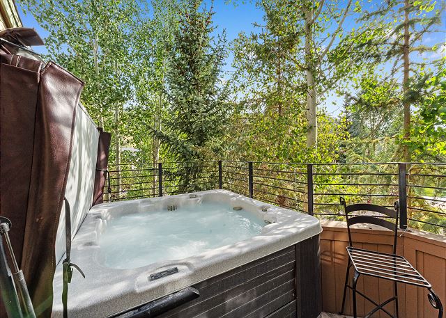 Private hot tub with incredible slope views located on the balcony. 