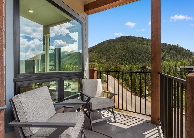 Private balcony with outdoor seating and incredible mountain views!