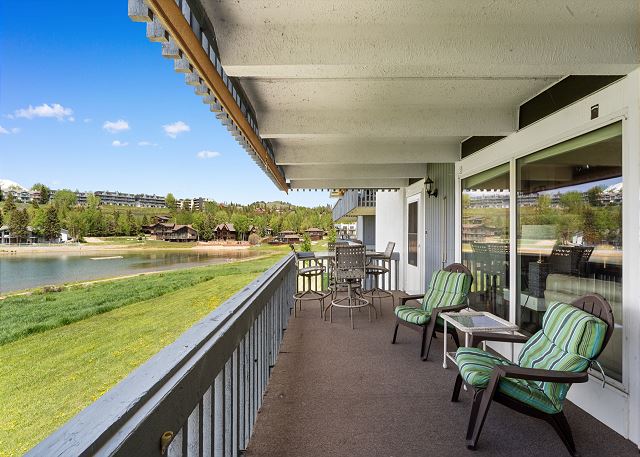 Spacious private balcony with outdoor seating and up-close lake views!