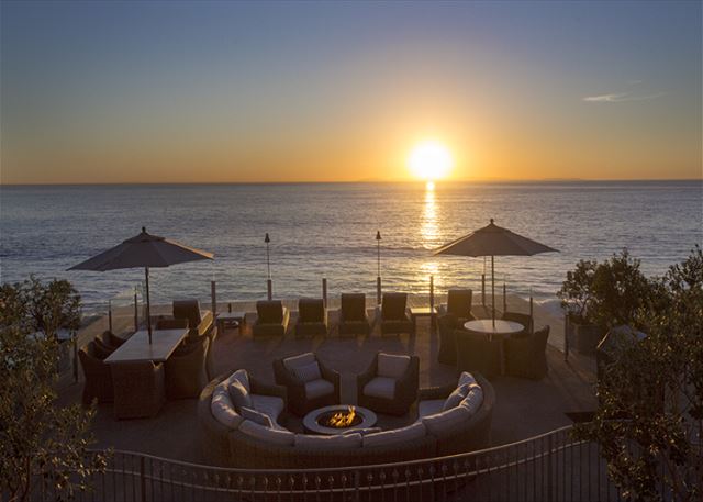 Our newly remodeled common area deck with a beautiful Laguna Beach sunset as a backdrop