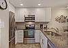 Fully Equipped Kitchen with Stainless Appliances