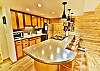 Kitchen with Slab Granite and Stainless Appliances