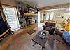 Living Area Has Flatscreen, Wood Fireplace