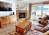 Living Area with Large Flatscreen, Gas Fireplace, Patio Entry
