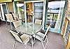 Covered Deck Table and Tall Seats