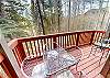 Main Deck with Table for 4, 2 Bar Stools