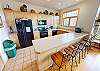 Fully Equipped Kitchen with Bar Seats for 6