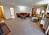 Downstairs Living Area with Flatscreen. Gas fireplace is under repair and turned off.
