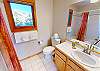 Upstairs Shared Hall Bath with Combo Tub Shower