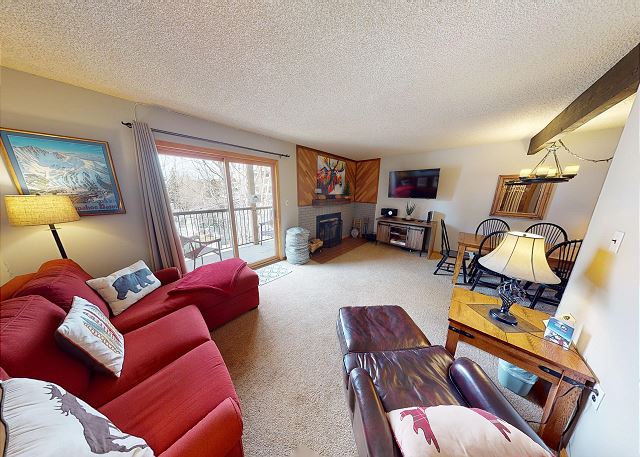 Living Area with Wood Fireplace, Flatscreen, Sectional