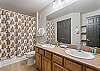 Primary Bedroom Bath with Double Sinks, Combo Tub Shower