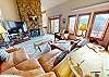 Spacious Living Area with Leather Sectional, Wood Fireplace, Flatscreen