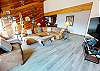 Living Room with Large Flatscreen, Wet Bar, Twin Sofabed in armchair