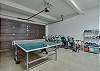 Garage with ping pong and bikes for your enjoyment