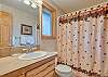 King Master bathroom with a tub/shower combo