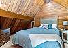 Loft seconds as bedroom #5 with a queen bed