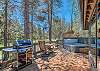 View of golf course from Deck. Deck furniture and BBQ. Hot Tub. 