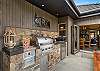 Stunning outdoor kitchen with BBQ and pizza oven
