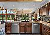 Kitchen view with dual dishwashers