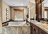 Upstairs soaking tub for King Master