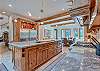 View from kitchen pantry into dining area and formal dining area
