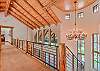 View Upstairs of Front Interior with a stunning chandelier