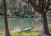 Swing along the river bank