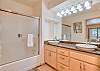 Master bathroom with tub shower combo
