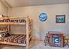 Game Room with Bunk Bed and Pac Man Cocktail Video Game Table 