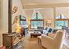 View of living room from sitting area. 