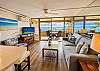 Whether the sky is brilliant blue or painted with dramatic clouds, the view from this living room is always unforgettable.