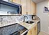 Beautifully remodeled with stainless steel appliances in the kitchen