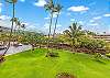 Lush tropical lawns and swaying palms, your everyday view from the lanai.
