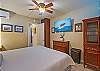A bedroom that makes hitting snooze feel like the right call. You're on island time now.