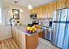 Fully equipped kitchen with tropical flair.