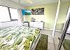 Tranquil retreat with plush bedding and décor.