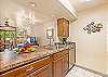 Modern elegance meets functionality in this open kitchen with stunning details.
