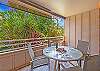 Surrounded by lush greenery, this tranquil lanai is your personal slice of Hawaiian paradise.