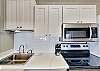 Granite countertops and new cabinets in this pristine kitchen!