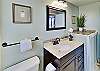 Nicely updated bathroom with plenty of counterspace