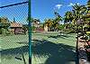 Enjoy a game of tennis on the newly surfaced court!