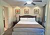 Island elegance meets soft comfort in this restful retreat with tropical touches.
