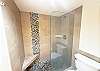 Whether post-beach or pre-luau, this spa-like bathroom is your retreat.