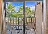 A peaceful balcony retreat surrounded by island beauty.