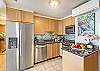 Modern kitchen with new countertops and cabinets for all your culinary needs