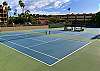 Enjoy a game of tennis on the newly surfaced court!