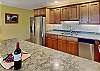 Beautiful counter tops offer ample space for preparing meals in!