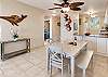 Dining table with seating for six, perfect for family dinners or game night.