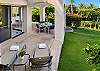 Relax in paradise on this spacious lanai, the perfect place to unwind after a day of island adventures.
