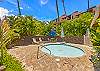 Unwind in the hot tub as the island breeze drifts by.